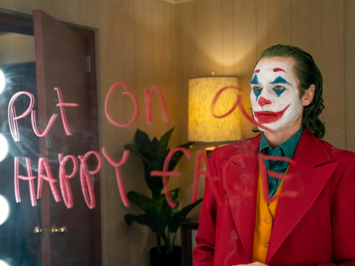 Хоакин Феникс в роли Джокера DC Шпалери
