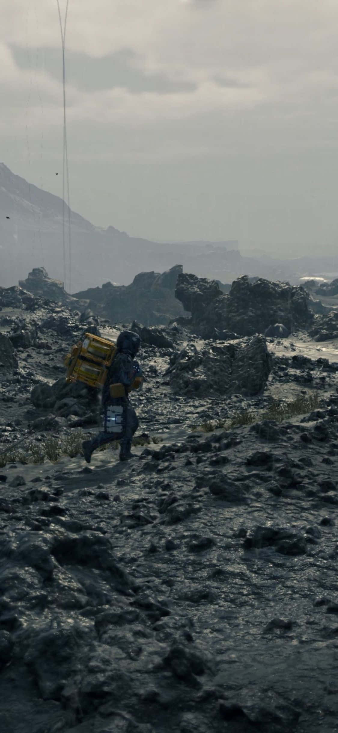 Исследуйте постапокалиптический мир Death Stranding на вашем iPhone X! Шпалери