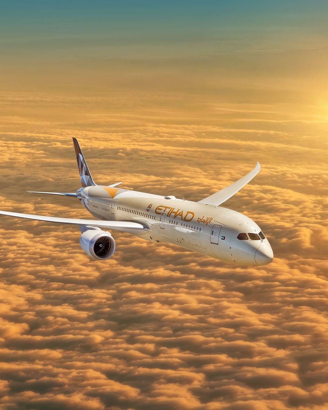 Захід сонця з Etihad Airways Шпалери