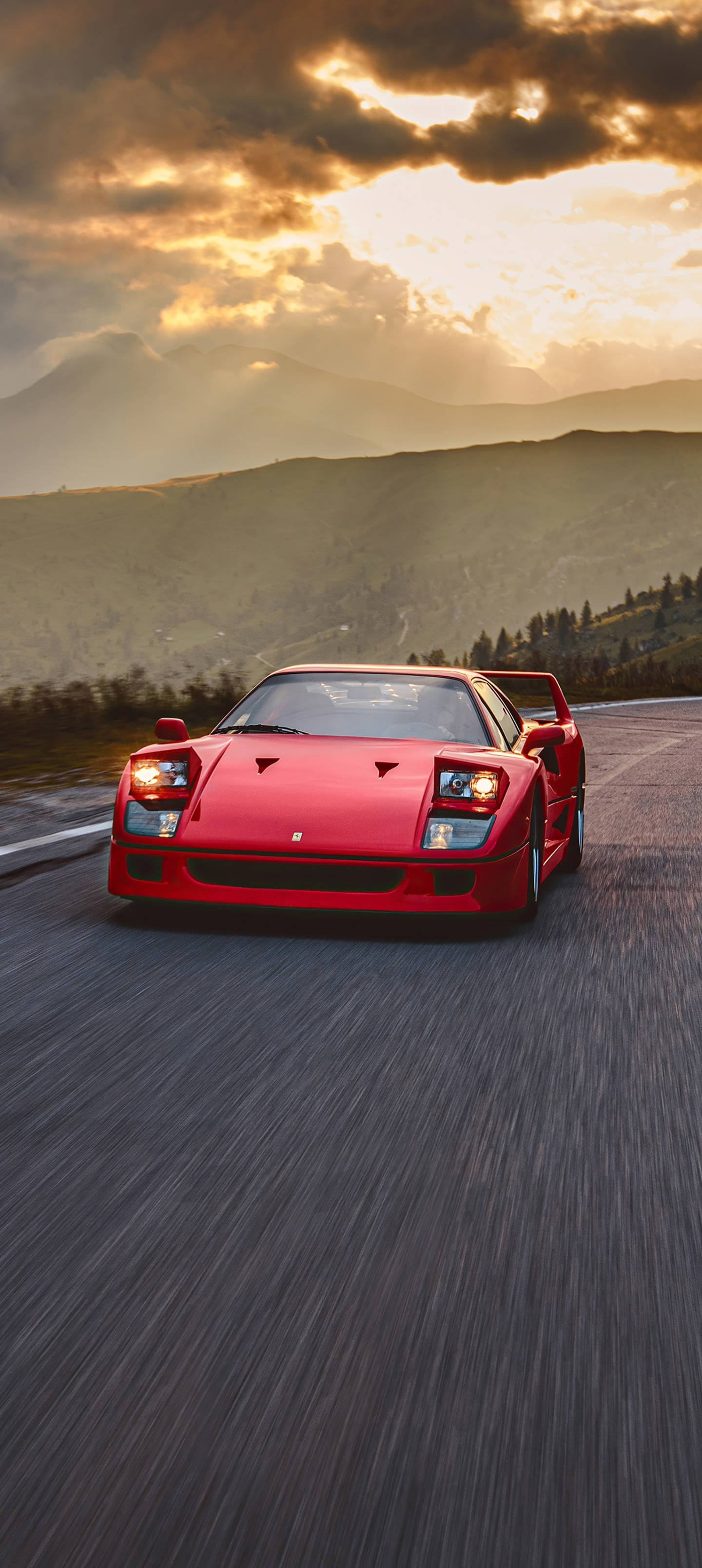 Телефон Ferrari F40 на заході сонця Шпалери