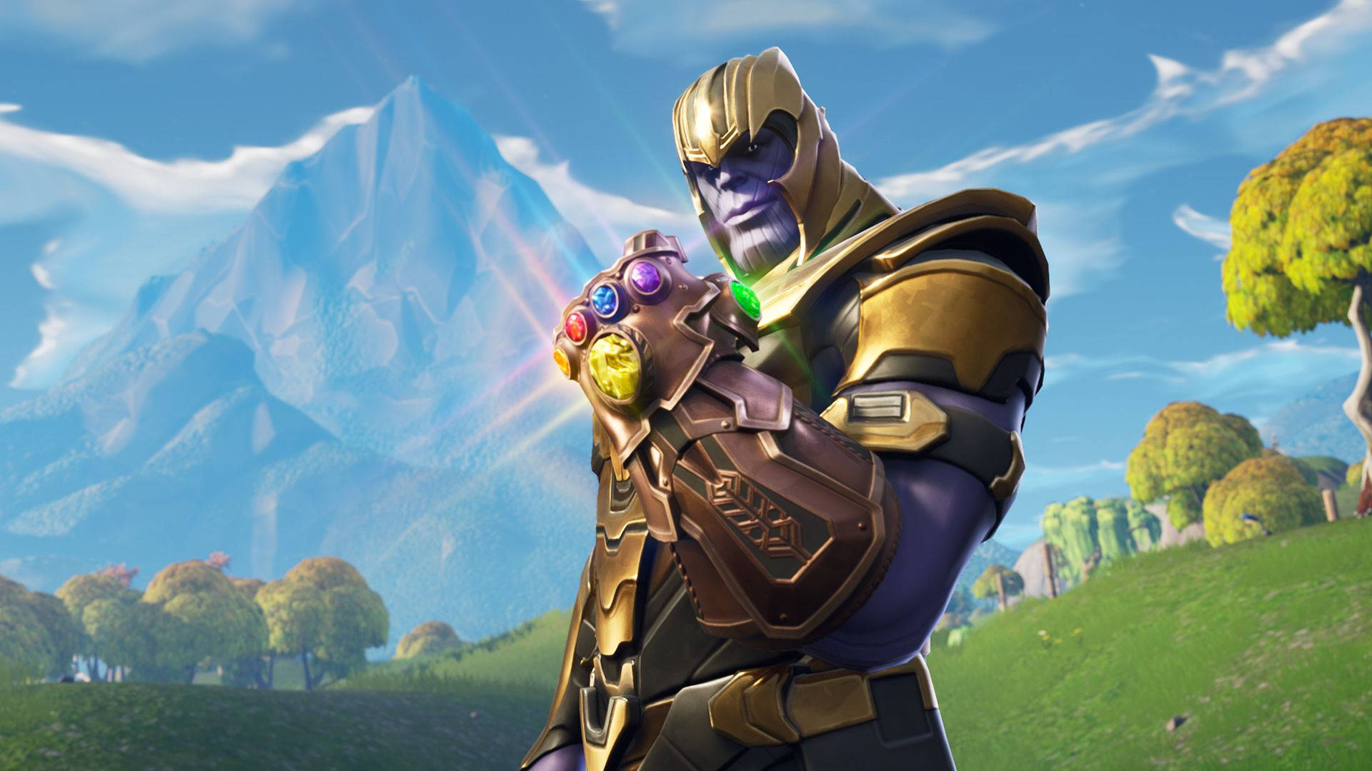 Шпалери HD Тануса у Fortnite, який тримає рукавицю нескінченності.