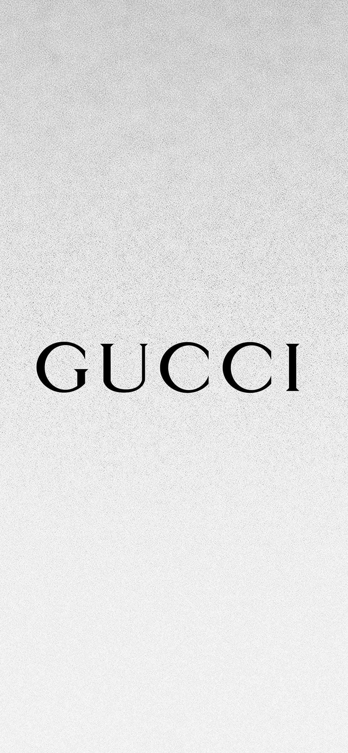 Елегантний серебристо-білий фон с текстом Gucci Шпалери