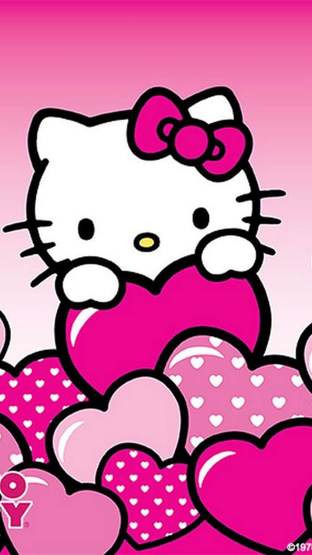 Мила рожева Hello Kitty обіймає сердечка Шпалери