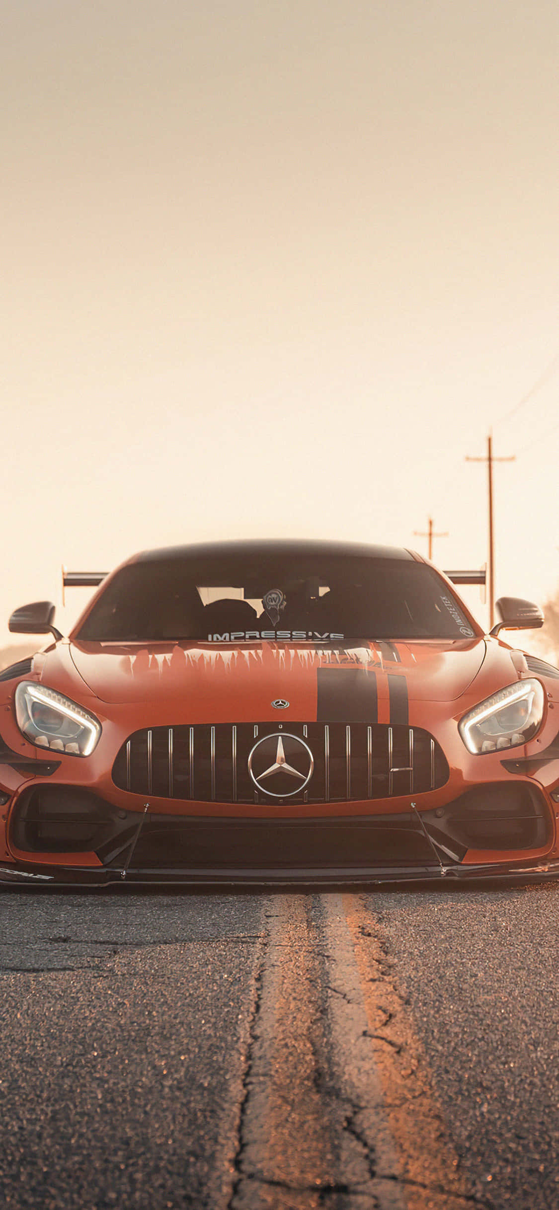 Фон iPhone X Amg Gt-r Оранжевый перед AMG GT Шпалери