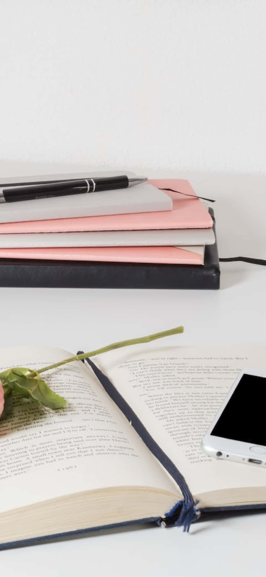 iPhone X Desk Background Stacks Of Papers With An Open Notebook Шпалери