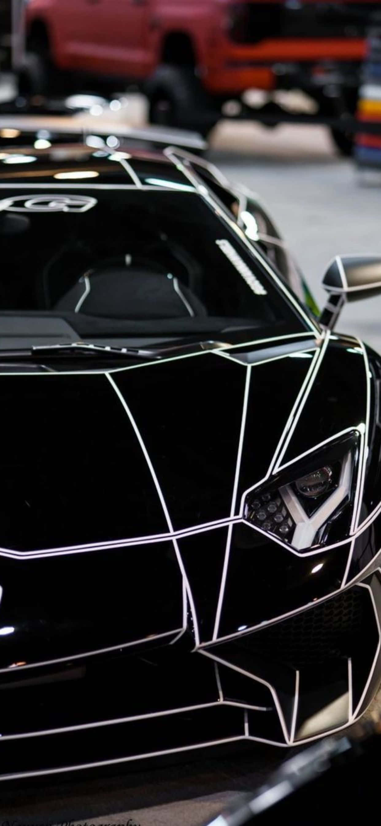 iPhone XS Max Lamborghini Глянцевый Чорний Фон Шпалери
