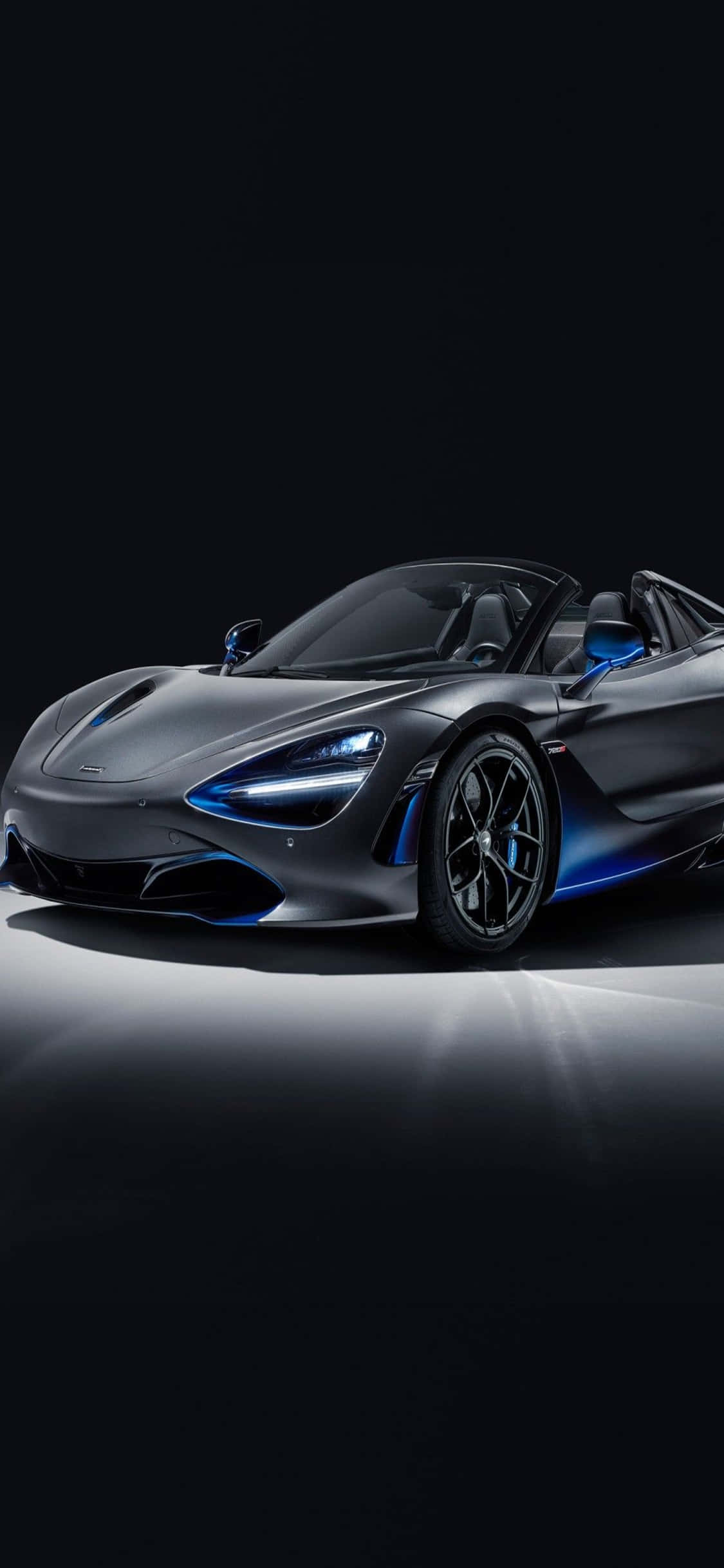 Відкрой для себя невероятную мощь iPhone Xs и McLaren 720S Шпалери