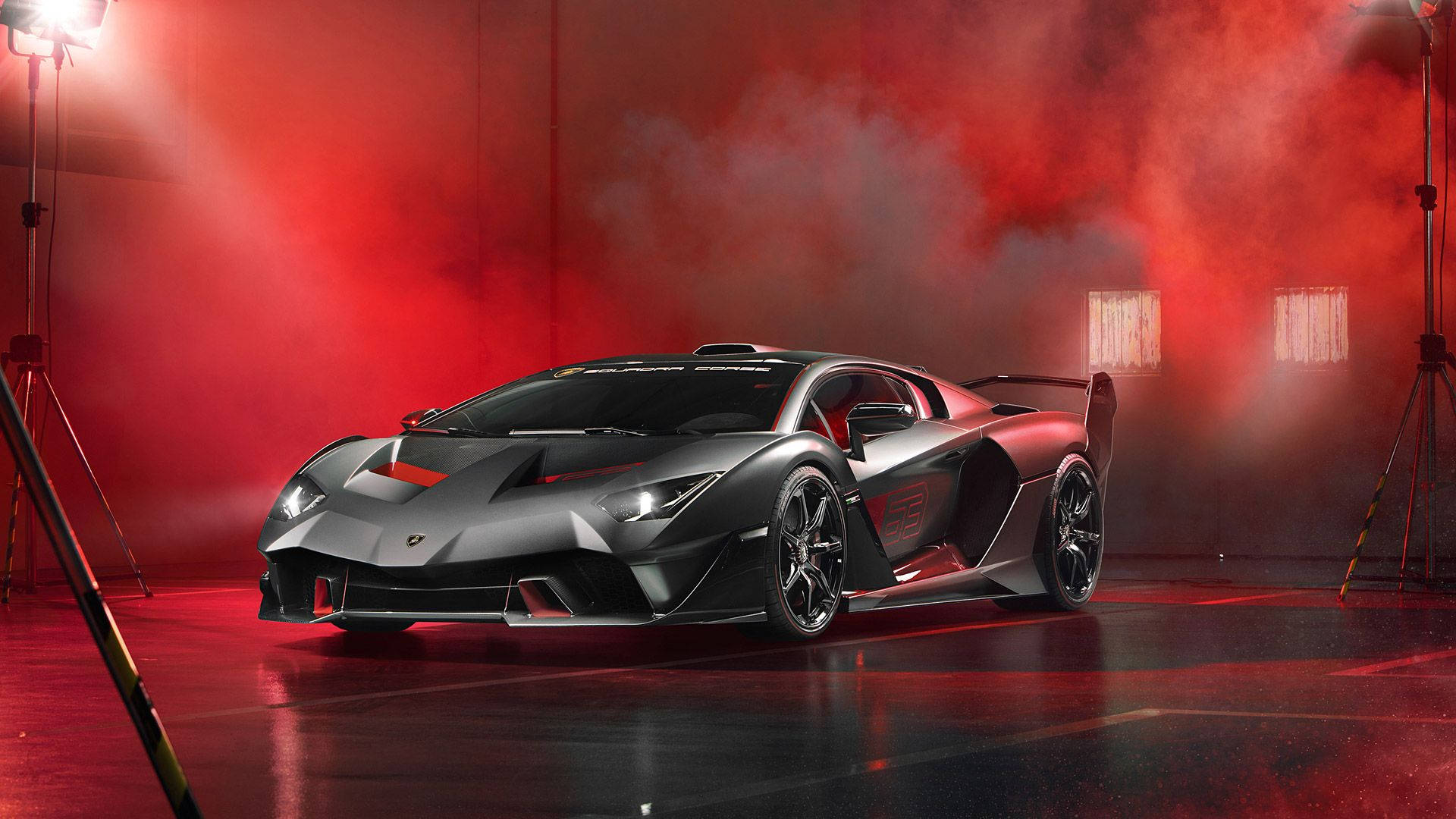 Чорний Lamborghini з червоним димом Шпалери