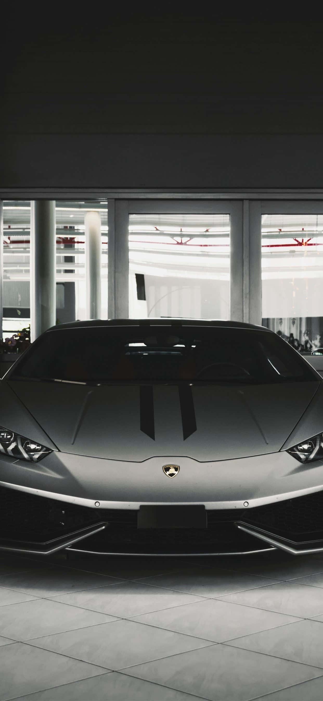 Черный Lamborghini iPhone вид спереди Шпалери