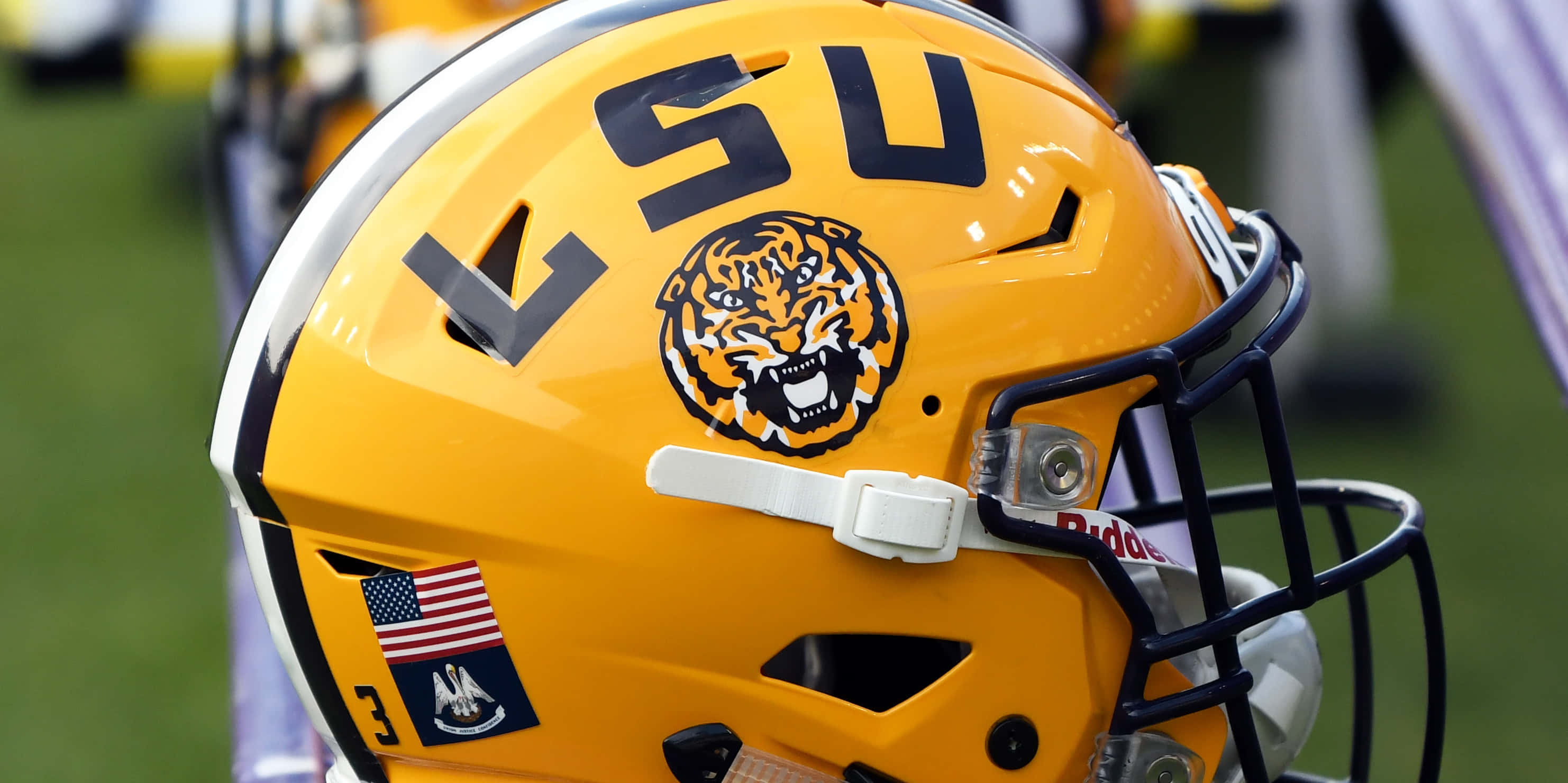 Жовтий шолом LSU Football Шпалери