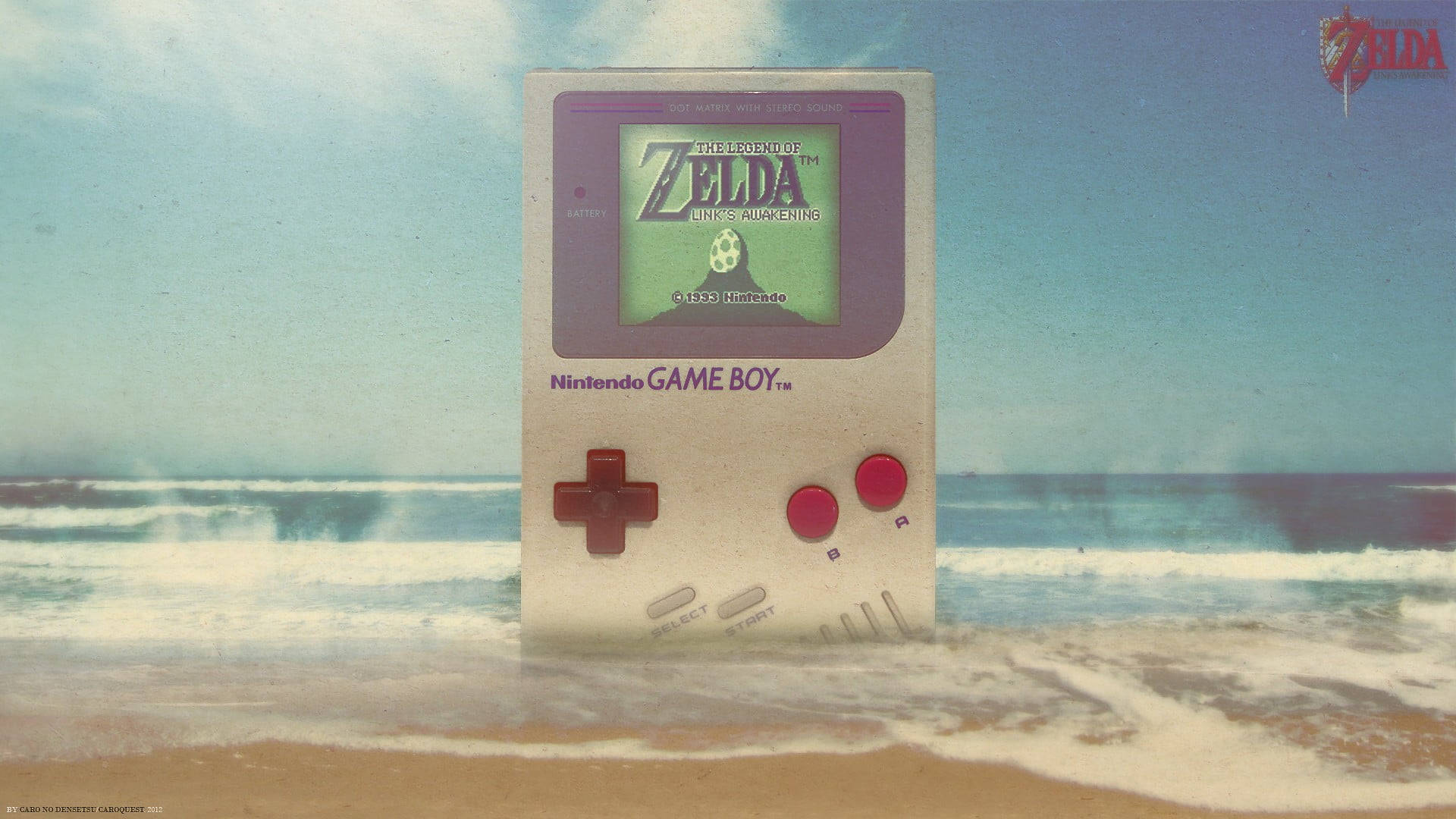 Гігантська Nintendo Game Boy на пляжі Шпалери