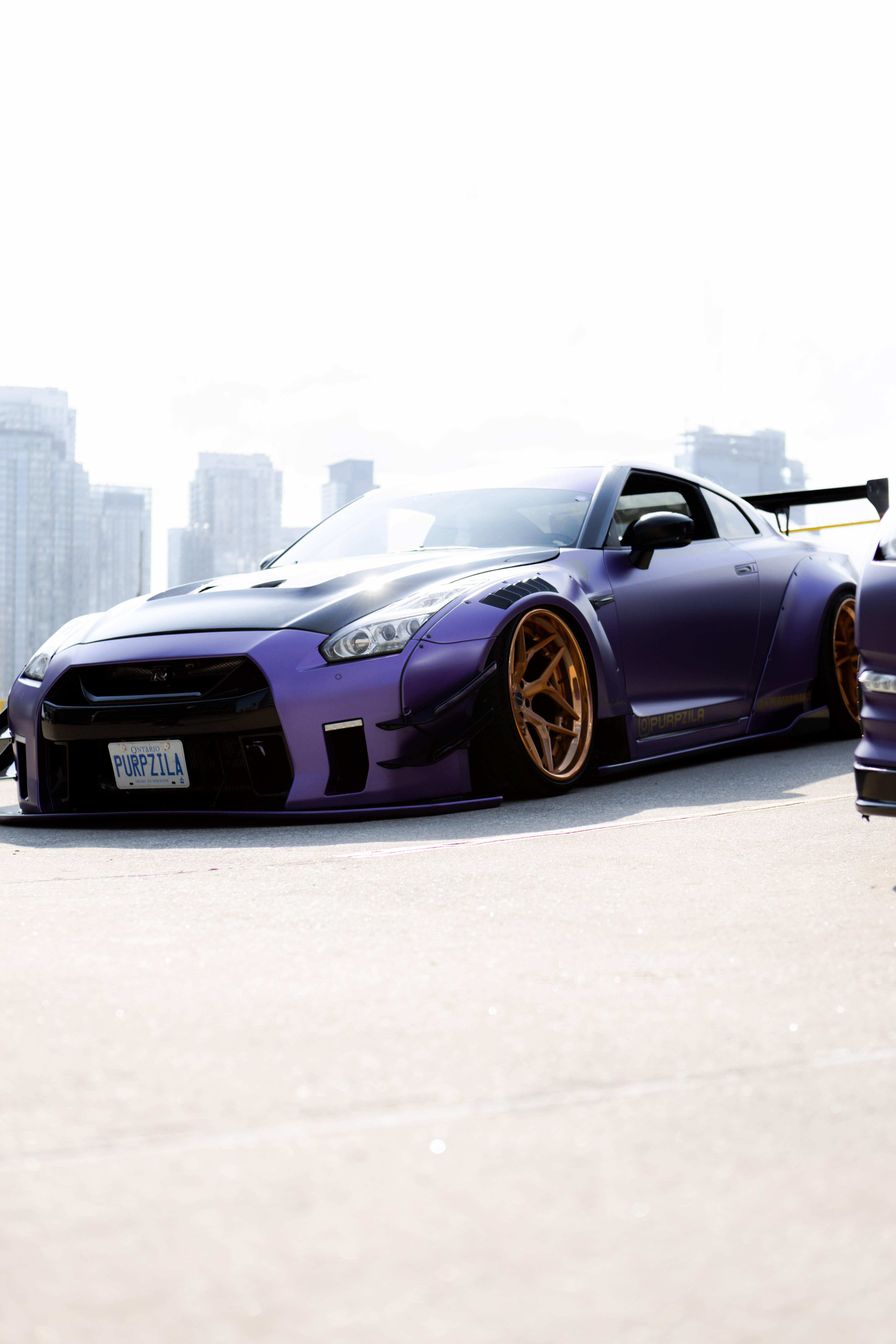 Фіолетовий Nissan Skyline GTR R34 Шпалери