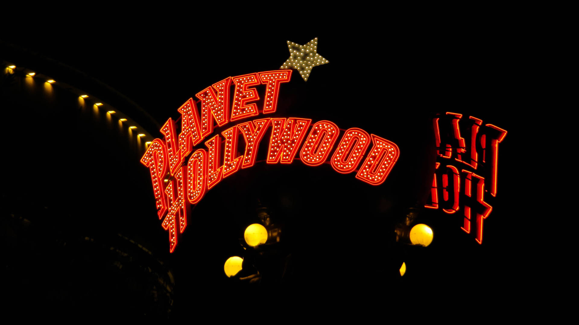 Вивеска ресторана Planet Hollywood Шпалери