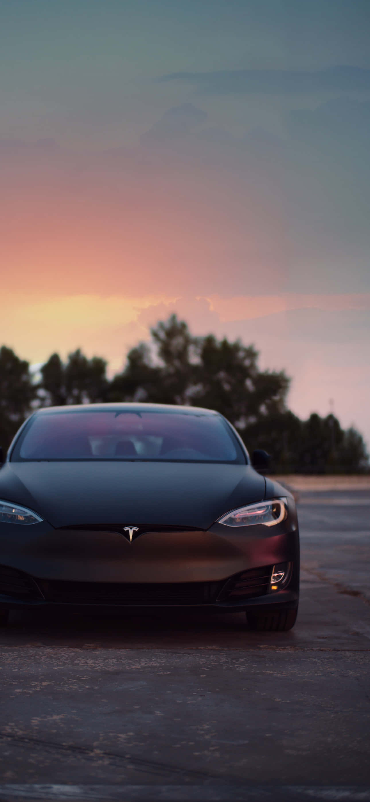 Наслаждайтесь безпроводным миром с Tesla iPhone. Шпалери