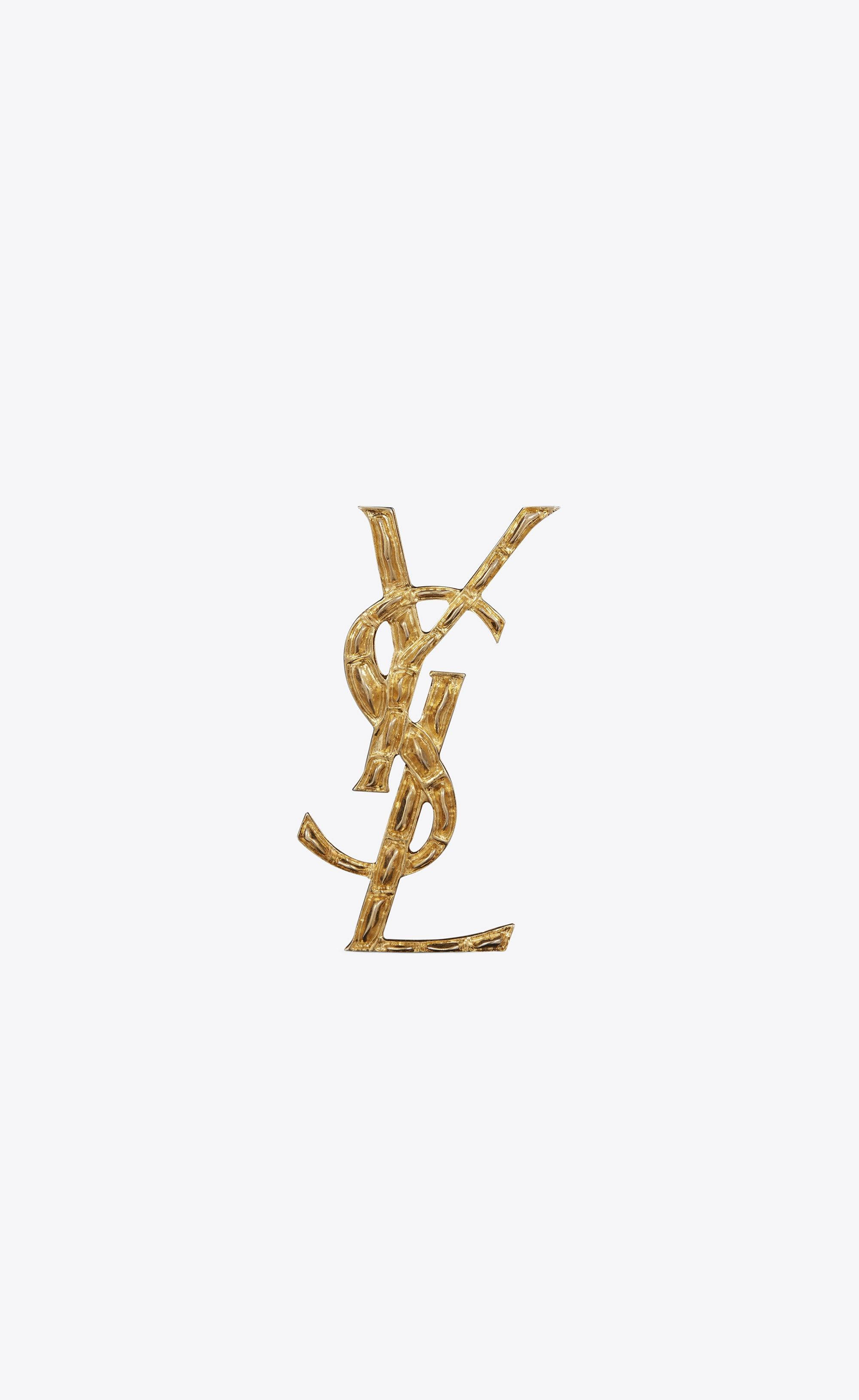 Золотая брошь YSL с крокодиловой текстурой Шпалери