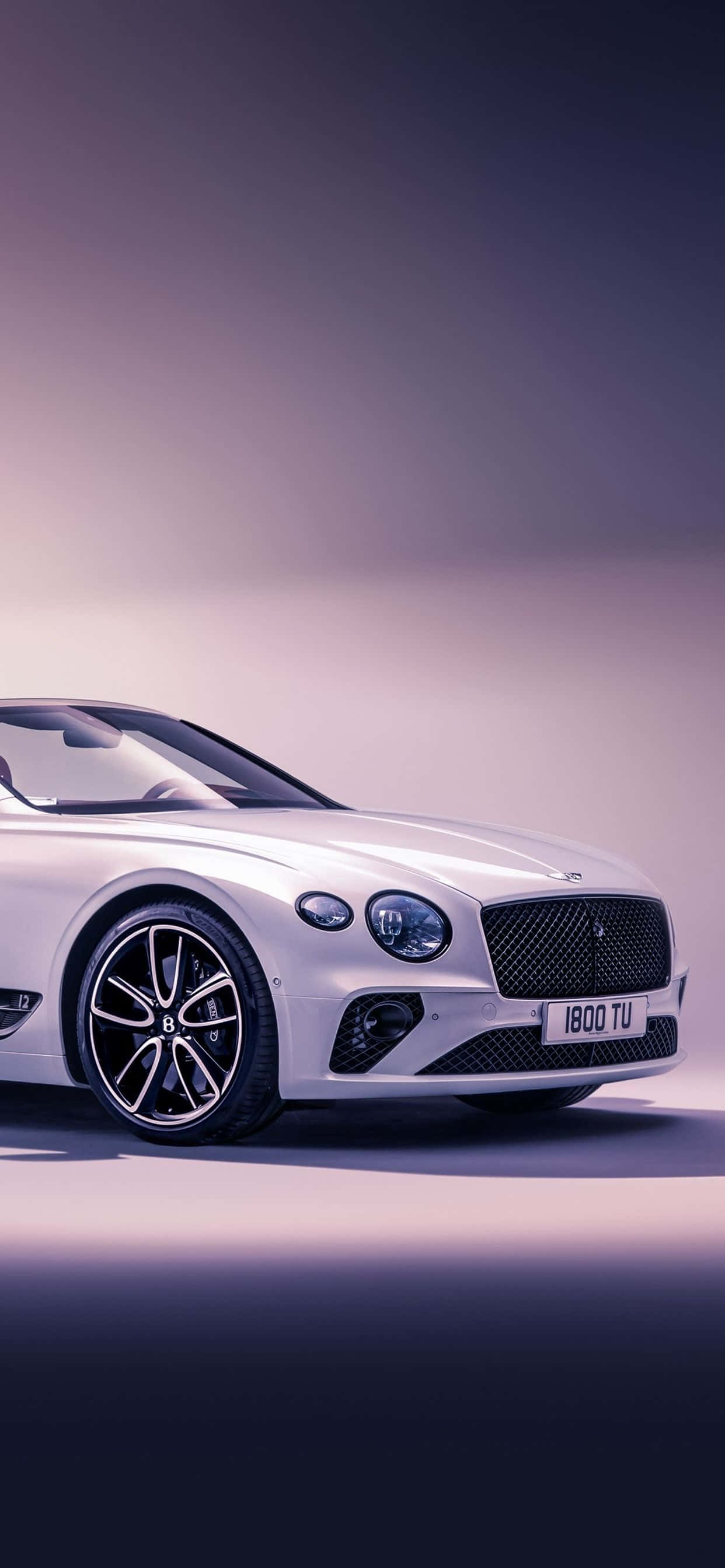 Боковой вид белого Bentley iPhone Шпалери