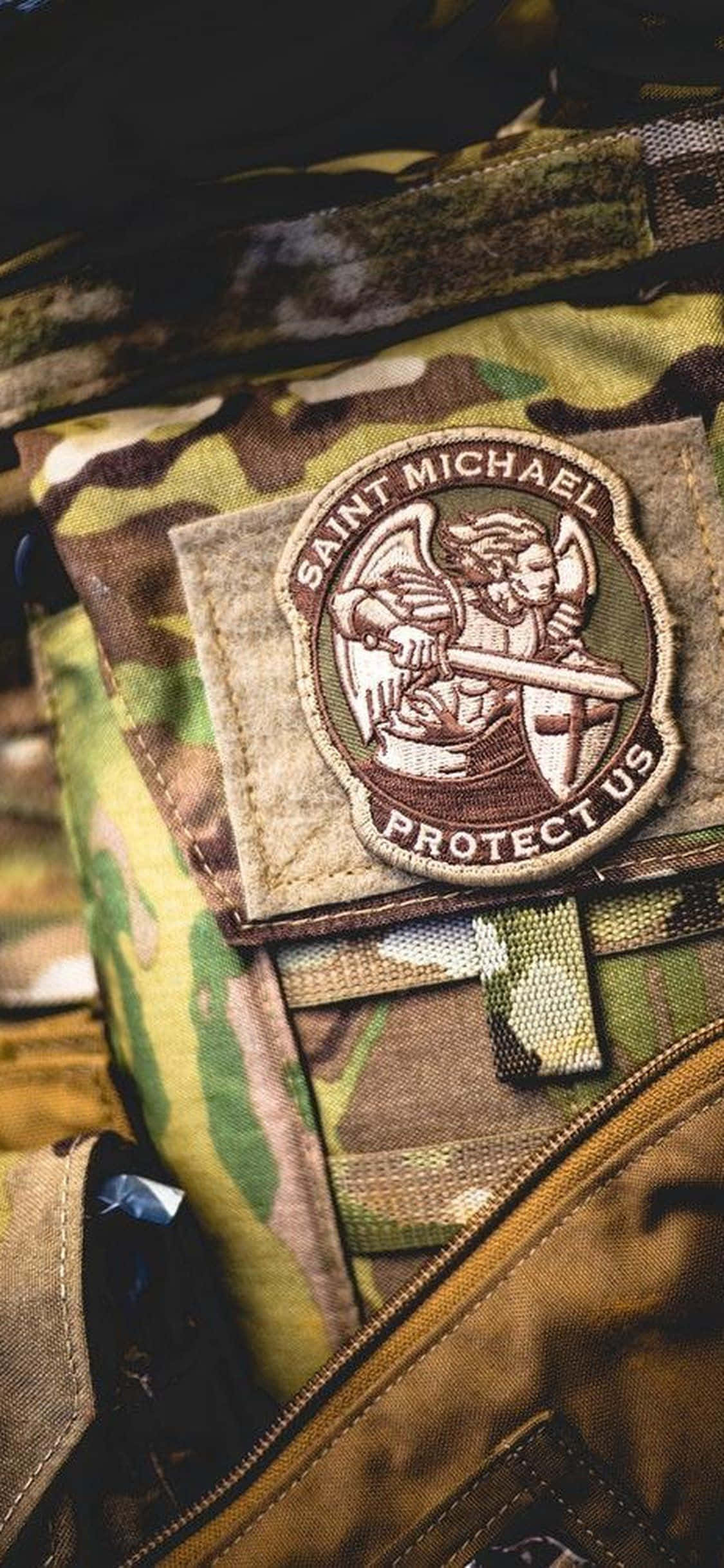 Крупный план нашивки военной формы Шпалери