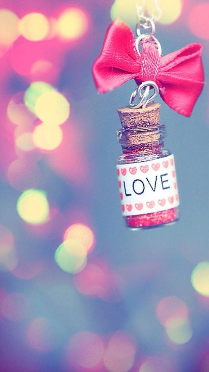 Милый брелок-бутылочка «LOVE» ко Дню святого Валентина Шпалери