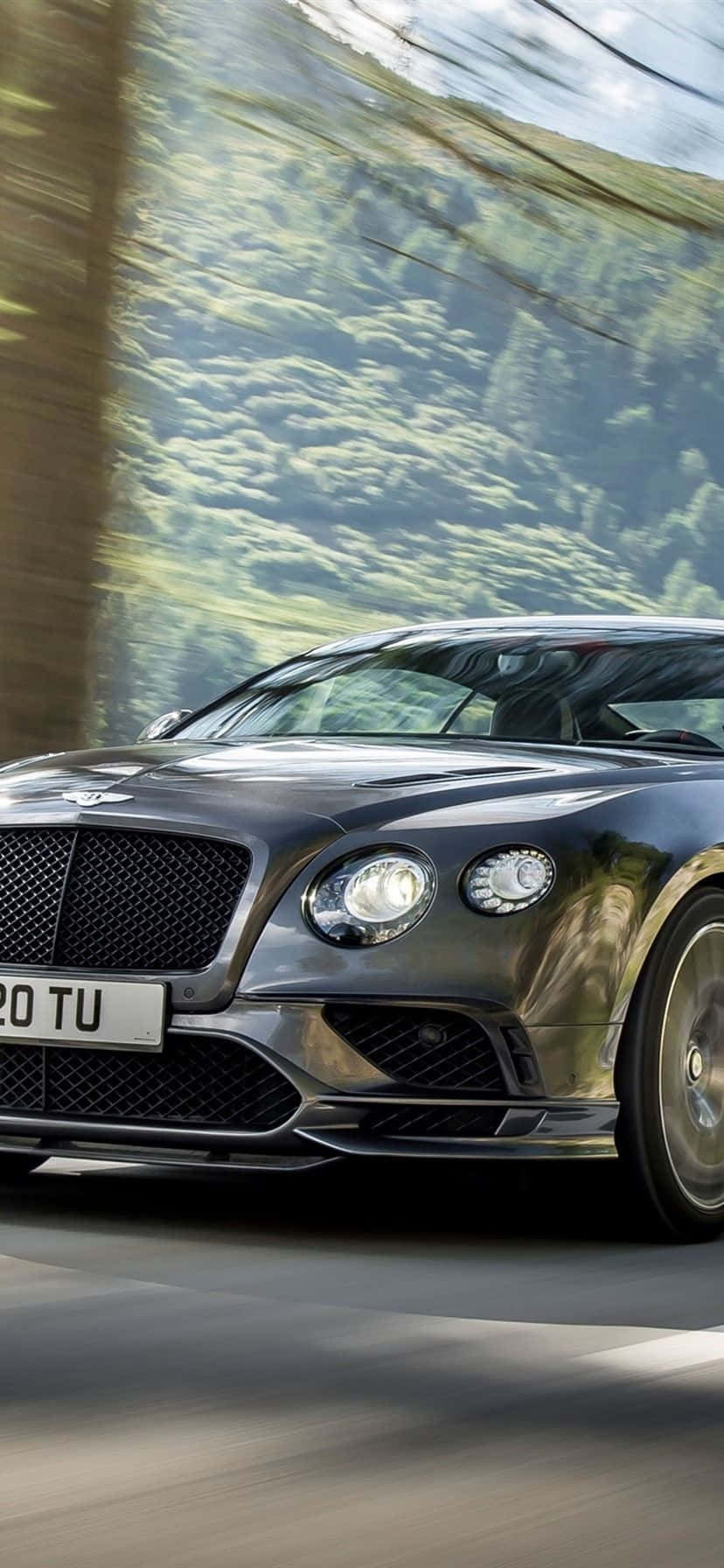 Мчащийся Continental Bentley iPhone Шпалери