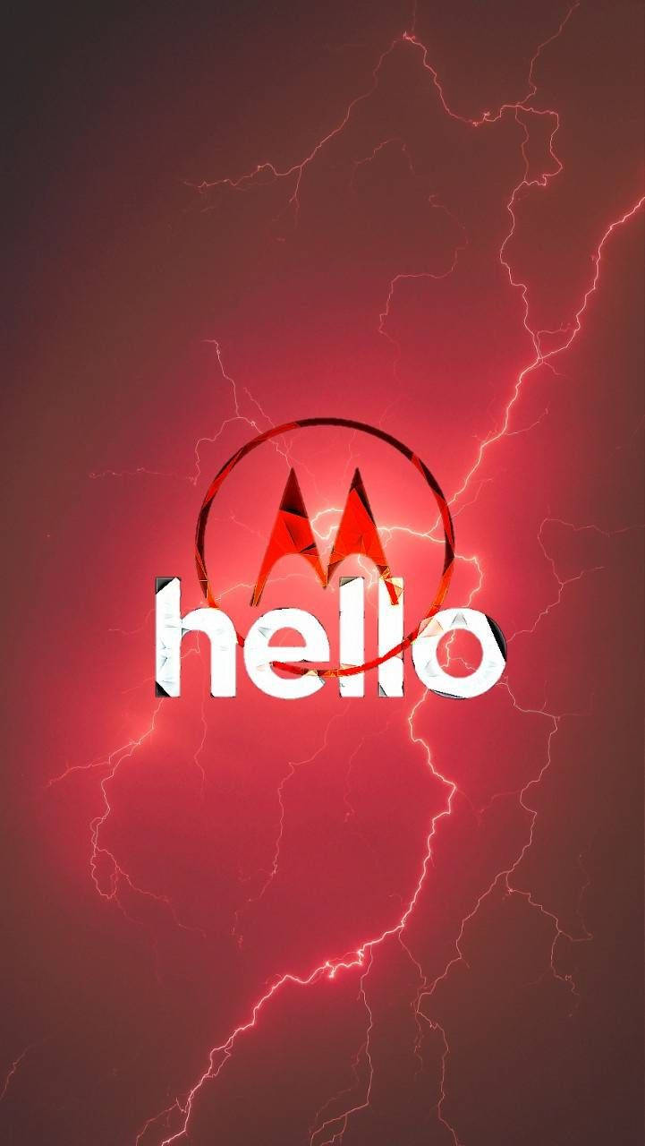 Новейший смартфон Motorola в руке Шпалери