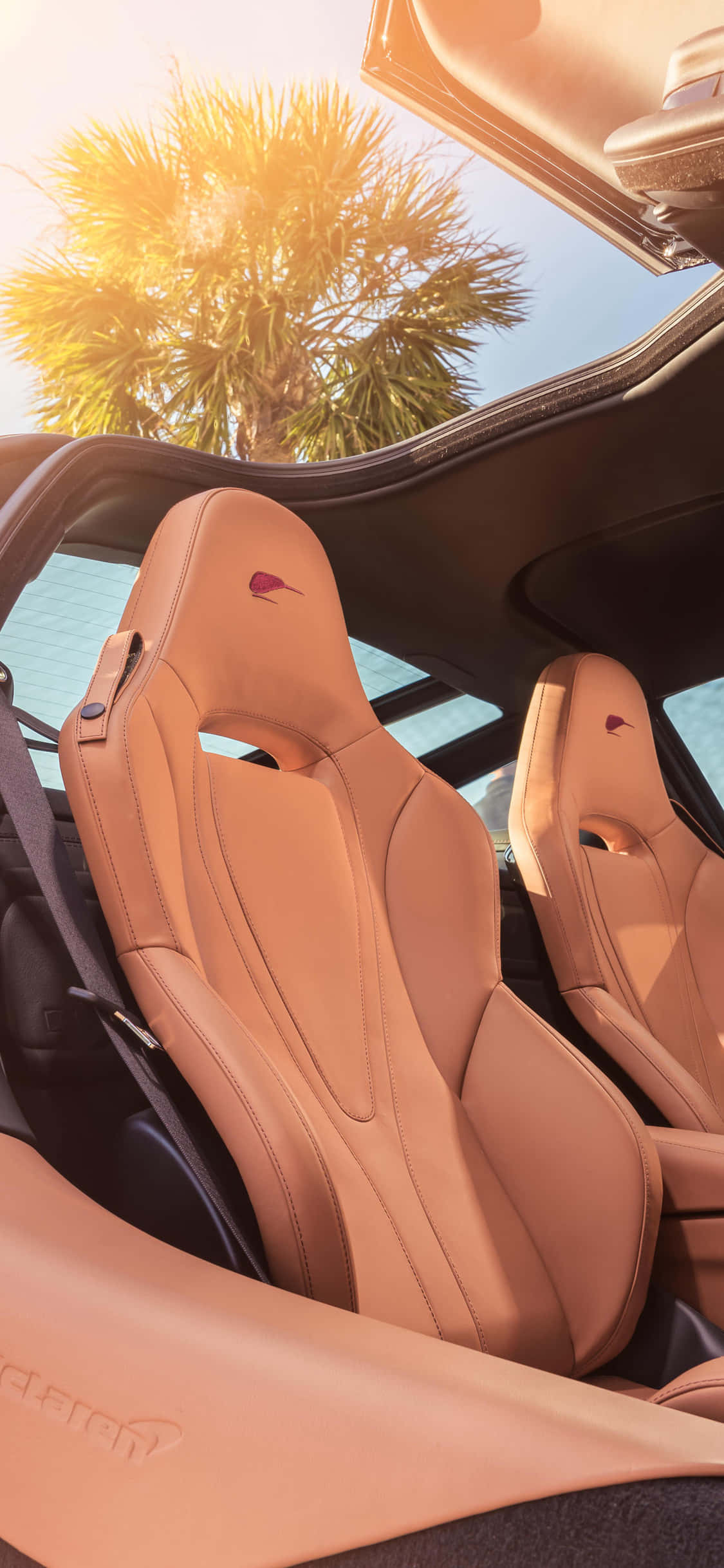 "Откройте стиль и мощь с iPhone Xs McLaren 720s" Шпалери