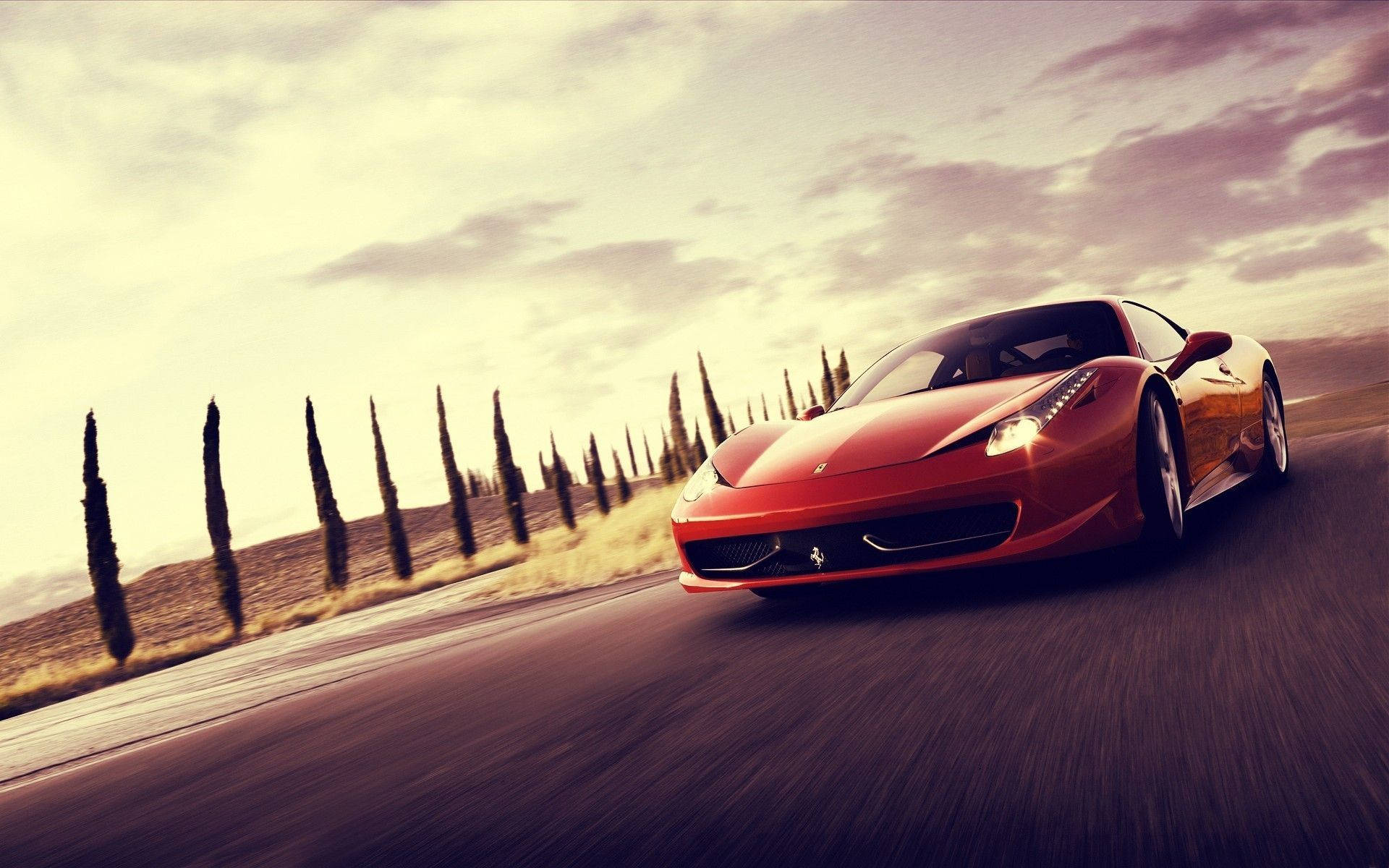 Шпалери з автомобілем червоного Ferrari 458 Italia в русі.