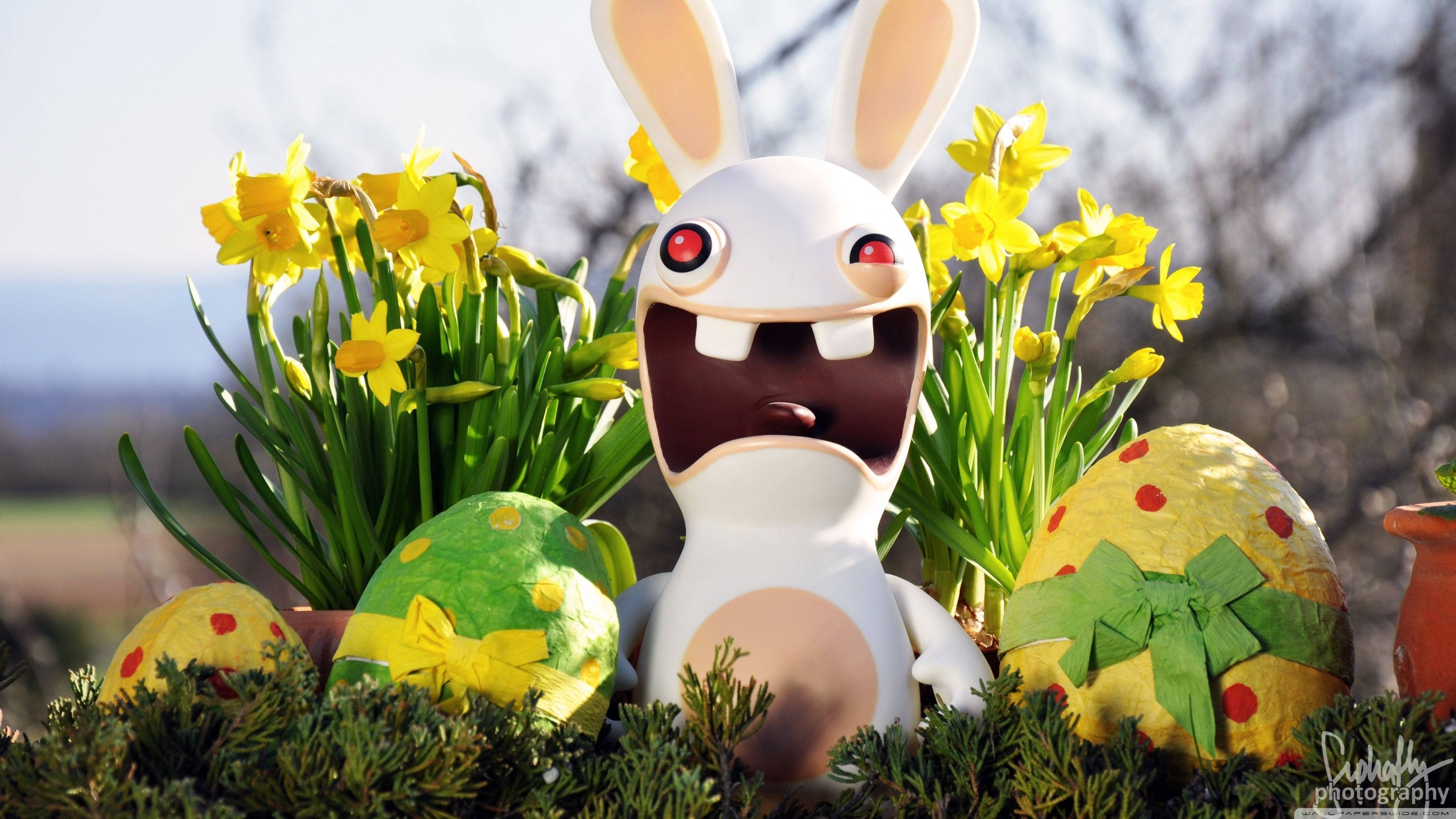 Святкуйте Великодень с этими колоритными яйцами Rayman Rabbid Шпалери