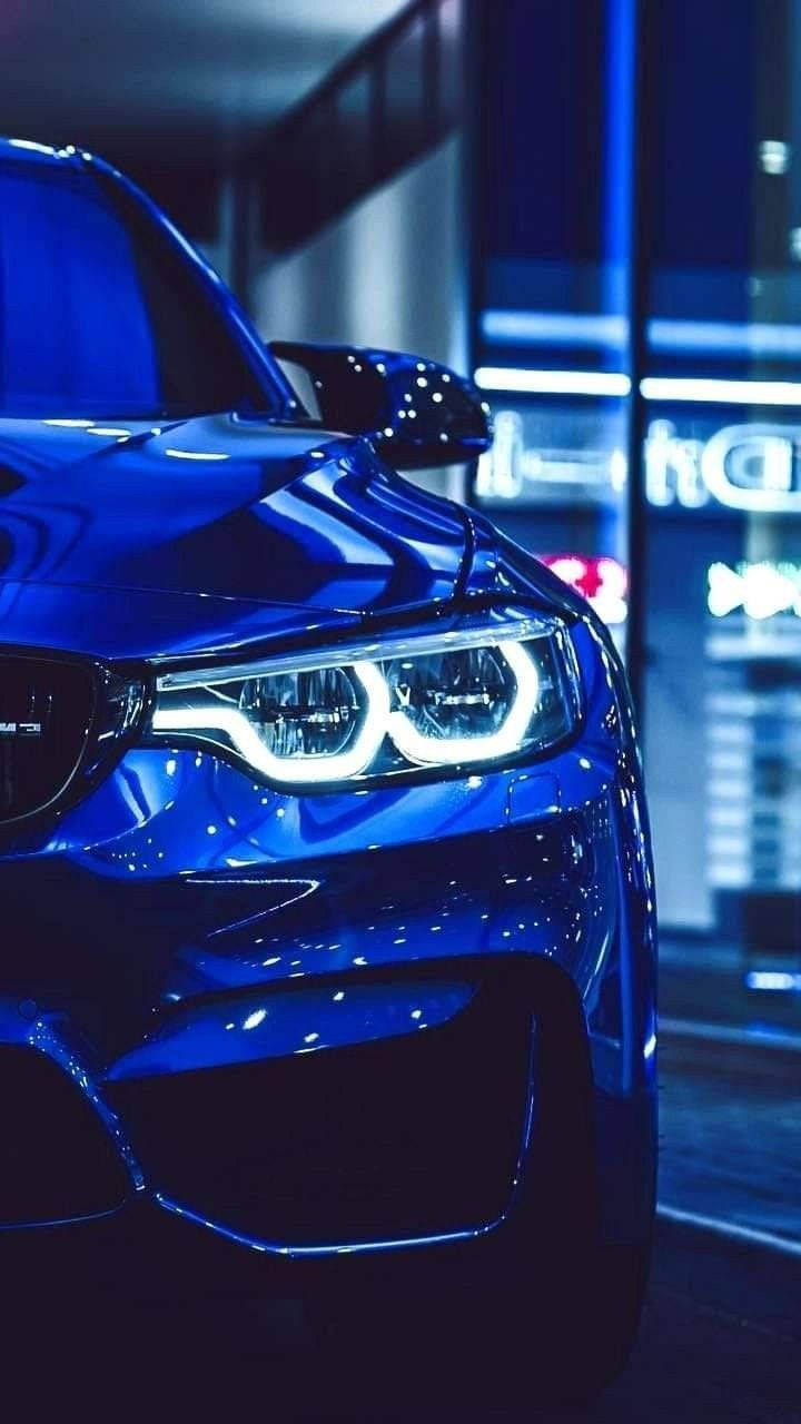 Світло фари синього BMW Шпалери