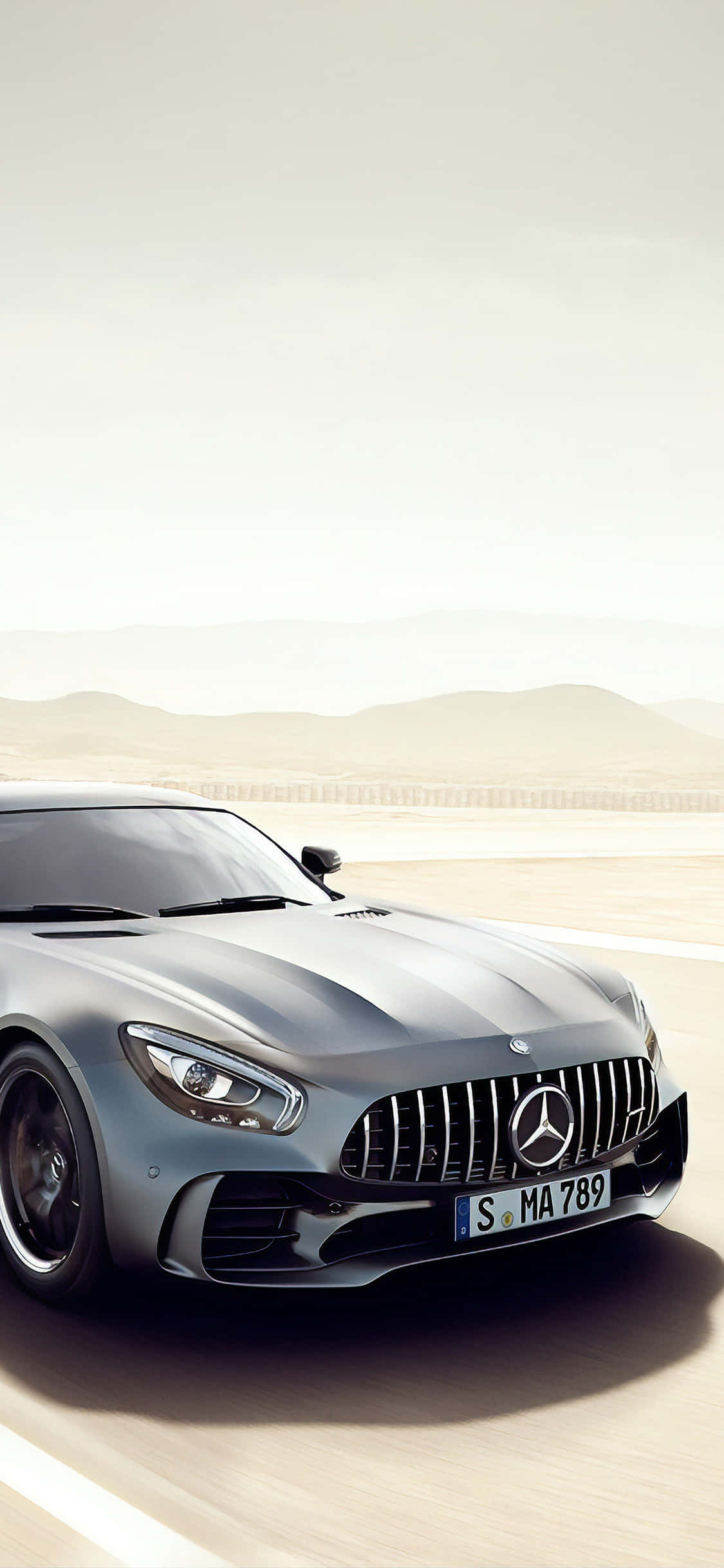 Серебристый фон Mercedes Amg для iPhone Xs в пустыне Шпалери