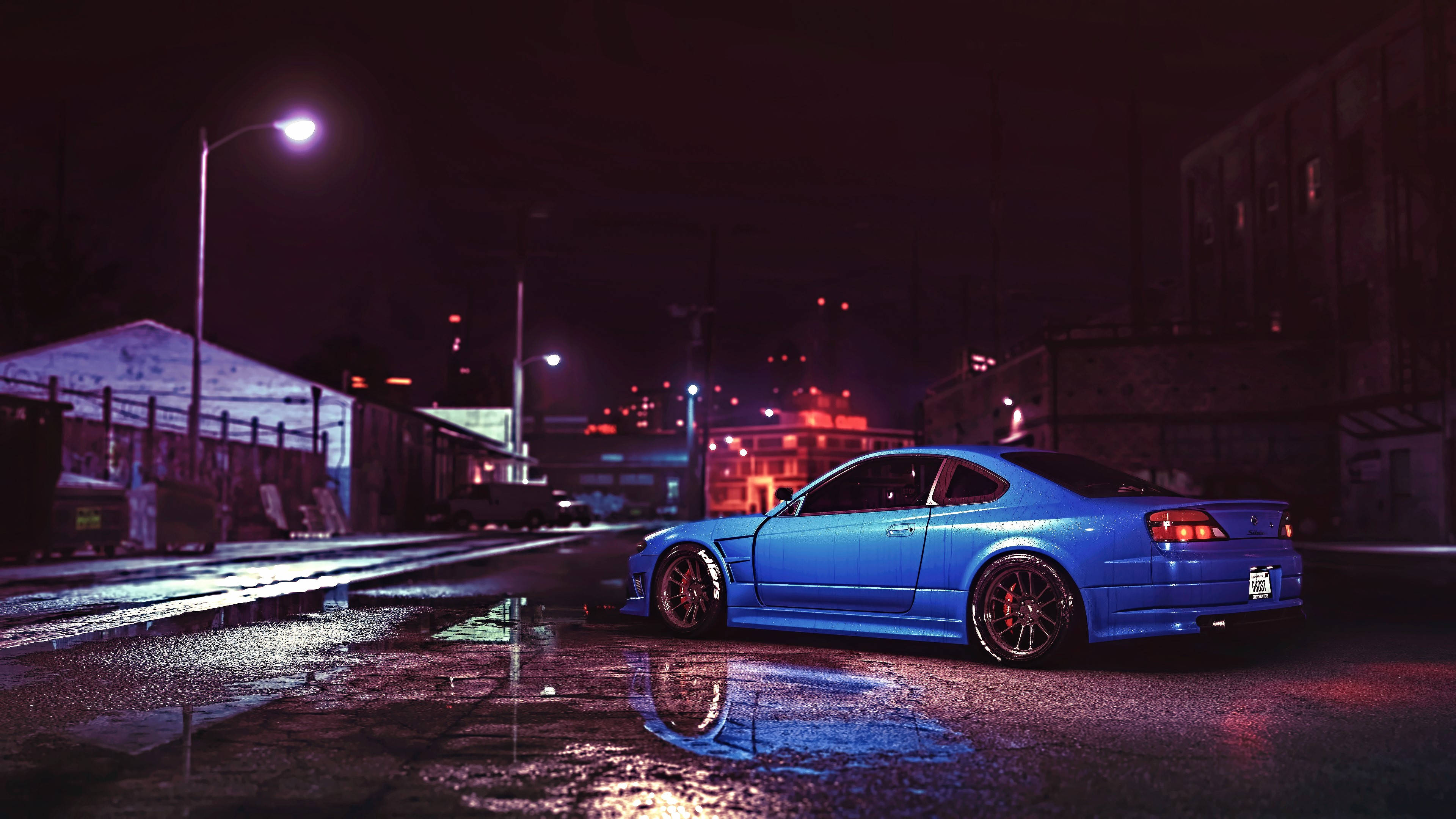 Сияющая синяя JDM-машина под ночным небом Шпалери