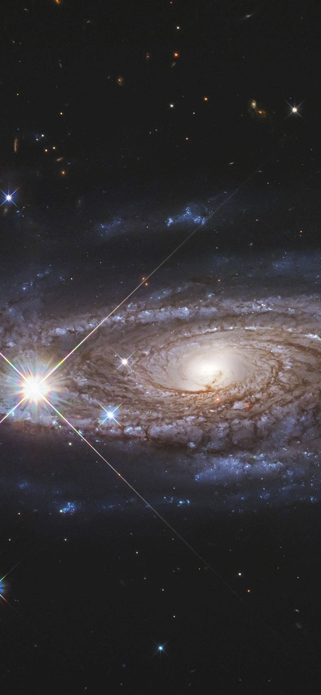 Сяюча галактика NASA для iPhone Шпалери