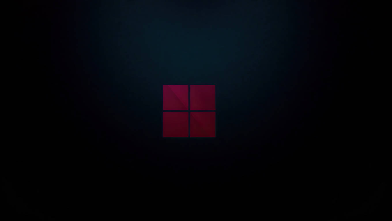 Темний ноутбук з логотипом Windows 11 Шпалери