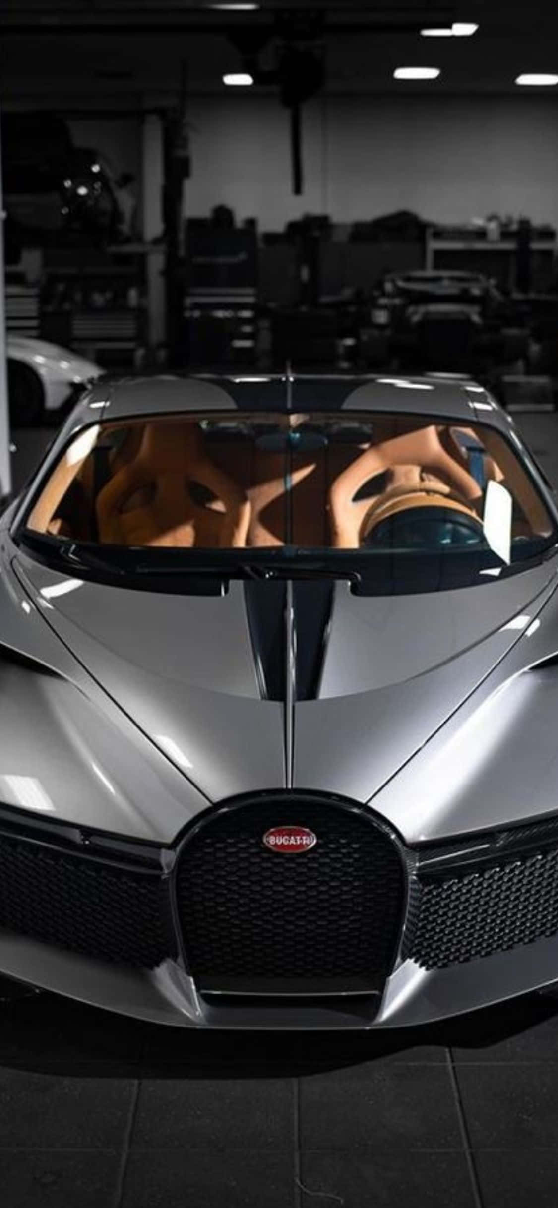 Уникальная роскошь: исследуйте мир с персонализированным iPhone Xs и Bugatti Шпалери