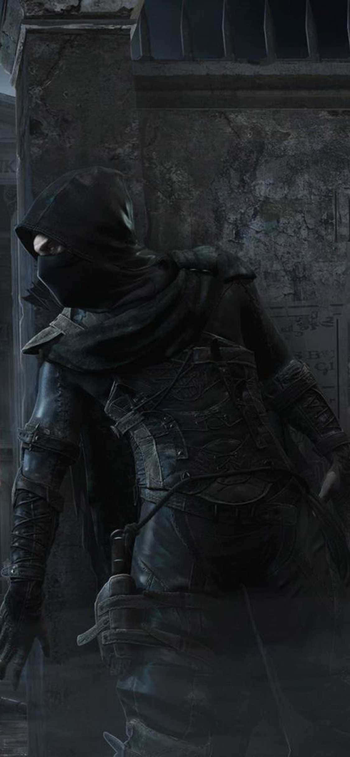 a man in a hooded robe is standing in a dark room Шпалери