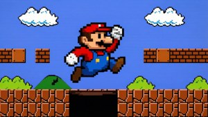 Піксельний Маріо стрибає через яму в класичному 8-бітному рівні Super Mario, ретро та ностальгійно. — Маріо Шпалери