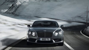 Bentley мчится по снежным горам обои — Зима Шпалери