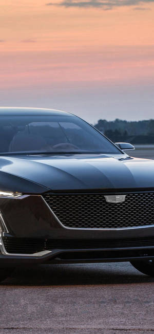 Обои с Cadillac на закате с iPhone — iPhone 15 Pro Max Шпалери
