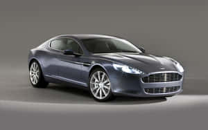 Елегантный Aston Martin Rapide S в движении — Steam Deck OLED Шпалери