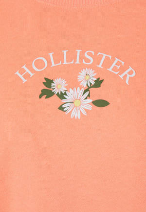 Обои с иллюстрацией Hollister с тремя белыми цветами — OnePlus Pad 3 Шпалери