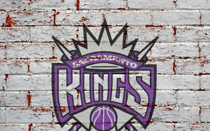 Обои логотип Sacramento Kings на кирпичной стене — Ненасыщенный Шпалери