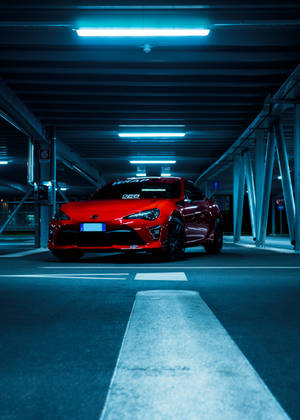 Обої с металлическим красным автомобилем Toyota — OnePlus Pad 3 Шпалери