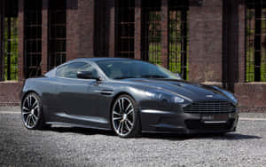 Потрясающий серебристый Aston Martin DB9 на гоночной трассе — Steam Deck Шпалери