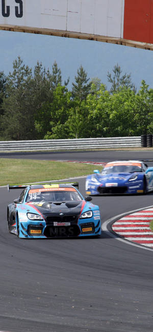 Синий BMW M6 GT3 гоночный автомобиль iPhone — Galaxy S24 Шпалери